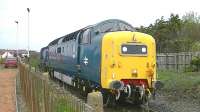 D9000 <I>Royal Scots Grey</I>  approaching Barassie sidings dragging EMU 334025 from Brodie Works, Kilmarnock. After running round in the sidings the train will continue north to Glasgow Works.<br><br>[Ken Browne 04/05/2013]