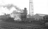 Shrouded in steam, A1 Pacific no 60144 <I>Kings Courier</I> with a freight at Newcastle Central in the 1960s. The train is about to pass the south side of the station on the goods lines.<br><br>[K A Gray //]