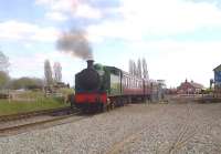 The Central Electricity Authority (Midlands) 0-6-0 number 4 makes a smokey departure (the 14.45) from Brownhills West, the main station on the Chasewater Railway, on Sunday 5th May. (They run steam on Sundays and diesel on Saturdays). The signal box just visible on the right came from Brereton, near Rugeley.<br><br>[Ken Strachan 05/05/2013]