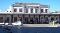 Granada station frontage on a fine spring May Day. Services operate from here to Almeria in the east; Sevilla in the west; and Madrid in the north. By rail to Madrid takes 4.5 hours and costs around 75 Euros. The bus takes around 5 hours and costs about 20 Euros. Hmmm.....<br><br>[Andrew Wilson 01/05/2013]