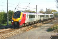 A late running Birmingham to Edinburgh Voyager approaches Balshaw Lane Junction on 6 May 2013.<br><br>[John McIntyre 06/05/2013]