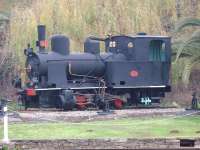 Regua, in the Douro Valley, had a mixed gauge depot with a fan of tracks around a turntable but no shed building. The last depot <I>switcher</I> was metre gauge 0-4-0T No. E1, built by Henschel in 1922, which would shunt locomotives of both gauges and make up narrow gauge freights. It was preserved on a plinth after withdrawal in the 1980s and can still be seen from the Regua station platforms. [See image 43368] of this locomotive when still in service.<br><br>[Mark Bartlett 04/02/2007]