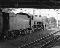 <I>The Great Marquess</I> propels the stock of 'The Fellsman' under Victoria Viaduct and into the stabling sidings on the west side of Carlisle station on a sunny 29 August 2012. After completing this manoeuvre the locomotive will run to Upperby for servicing and turning.<br><br>[Bill Jamieson 29/08/2012]