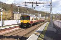 Having just called at Bowling on 27 April, an eastbound service pulls away on the short leg to Kilpatrick.<br><br>[John McIntyre 27/04/2013]