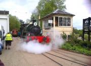 After a vigorous day celebrating its 100th birthday at a massive public garden party, 'Sir Robert McAlpine No. 31' coasts down into the shed at Fawley Hill on 18th May. The sign on the right reading 'Beware of Shunting' seems appropriate.<br><br>[Ken Strachan 18/05/2013]