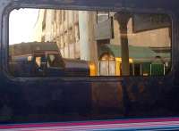 To paraphrase a certain female singer, 'I used to live in a room full of mirrors, all I could see was 37194 and 66511 reflected in an HST carriage window'. Doesn't scan very well, but you get the idea.<br><br>[Ken Strachan 19/05/2013]