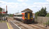 Platform view looking west at Brandon, Suffolk, on 21 May 2011 as an East Midlands Liverpool Lime Street - Norwich service runs through the station.<br><br>[Ian Dinmore 21/05/2011]