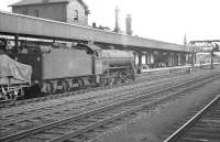 An up goods trundles south through Doncaster in the summer of 1961 behind Class O2 2-8-0 no 63969.<br><br>[K A Gray 08/07/1961]