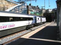 Platform 1 at Haymarket on 17 May 2013, with the East Coast 09.52 Aberdeen - London Kings Cross about to leave platform 1 and enter Haymarket Tunnel. <br><br>[John Furnevel 17/05/2013]