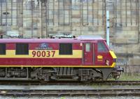 <I>Spirit of Dagenham</I> - not exactly a name to set the pulses racing, although I don't suppose <I>Pretty Polly</I> came into that category eiither! 90037 is stabled in the sidings on the west side of Carlisle station on the afternoon of 13th April 2002.<br><br>[Bill Jamieson 13/04/2002]