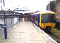 The 19.24 service to Twyford waits at Henley-on-Thames on 18th May 2013. The text on the booking office soffit board reads 'Thank you for using the Regatta Line'.<br><br>[Ken Strachan 18/05/2013]