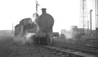 The yard at Bescot in October 1964, with class G2A 0-8-0 no 49361 featured.<br><br>[K A Gray 22/10/1964]