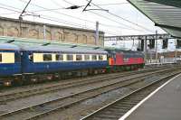 Rail Express Systems liveried 47783 pauses at Carlisle with a returning Stevenage - Edinburgh - Stevenage railtour on 13 April 2002. The outward journey had been via the ECML with the return over the Settle and Carlisle to Leeds.<br><br>[Bill Jamieson 13/04/2002]