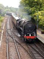 70000 <I>Britannia</I> passing Brundall on a rainy 16 July 2011 with the 1Z72 16.40 Great Yarmouth- London Liverpool Street RTC <I>Easterling</I> railtour. 47580 <I>County of Essex</I> is attached to the rear of the train.<br><br>[Ian Dinmore 16/07/2011]