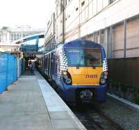 The 13.07 service to Milngavie boarding at  Waverley platform 8 on 17 May 2013. <br><br>[John Furnevel 17/05/2013]