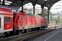 Adtranz built Bo-Bo electric 145 035 awaits departure from Aachen Hbf on 1 September 2009 with a rake of double deck coaches forming a morning limited stop Regional Express service to Hamm.<br><br>[Bill Jamieson 01/09/2009]