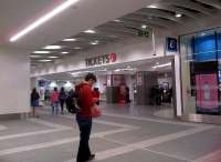 Now let's see - my map app tells me there's a ticket office round here - I wonder where it is? A young passenger finding his way around the new New Street on 19th May. Notice how WHSmith always blends in [see image 42033].<br><br>[Ken Strachan 19/05/2013]