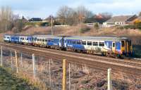 A Northern 156+150 combination heading along the up WCML just south of Farington Curve Junction on 17 March 2013 with a Preston to Buxton service.<br><br>[John McIntyre 17/03/2013]