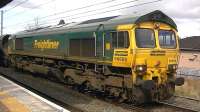 Freightliner 66606 with the 6M11 Killoch - Fiddlers Ferry passes Warrington Bank Quay on 18 April 2013.<br><br>[Ken Browne 18/04/2013]