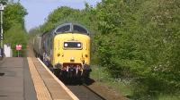 Deltic no D9000/55022 Royal Scot Grey passes Kilmaurs with 6Z53 Glasgow Works to Brodie's Bonnyton Works Kilmarnock 334030 drag for refurbishment<br><br>[Ken Browne 25/05/2013]