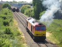 DBS 60017 is opened up on 5 June as it reverses onto a rake of empty bogie tanks at the Colnbrook fuel terminal supplying nearby Heathrow Airport. The class 60 had just been started up on the other side of London Road following a 7 hour layover.<br><br>[David Pesterfield 05/06/2013]