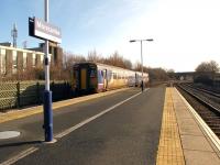 An afternoon train from Lancaster arriving at Morecambe on a sunny March afternoon in 2010.<br><br>[Ian Dinmore /03/2010]