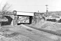 This location in Savile Town, Dewsbury, once rejoiced in the title of Headfield Junction but these days were long gone by 1982. However the former GNR Railway Street yard was still in operation, hence retention of the one-time link between the L&YR at Headfield Jn and Dewsbury Jn on the GNR's Dewsbury loop. The L&YR line had run through the masonry arch bridge on the left to terminate at Market Place station which was closed by the LMS in 1930. [See image 41342]<br><br>[Bill Jamieson /04/1982]