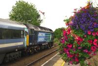 DRS 47712 pulling away from the Acle stop bound for Great Yarmouth in July 2011, with 47802 on the rear of the train.<br><br>[Ian Dinmore 14/07/2011]