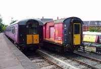 Coaches on display at the Rushden Transport Museum and Railway, Northants in June 2013. The coach on the left is used as a games room by the museum social club, and contains a pool table and dart board as well as seating accommodation. <br><br>[John Steven 02/06/2013]