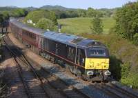 Royal Train-liveried 67006 passes Inverkeithing East Junction with the returning Edinburgh - Fife evening commuter service on 10 June.<br><br>[Bill Roberton 10/06/2013]