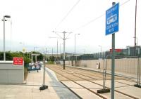 The tram stop at Gyle Centre on Edinburgh's west side. View south towards Edinburgh Park on 7 June 2013 with the Gyle car parks and shopping mall off picture to the left.  <br><br>[John Furnevel 07/06/2013]