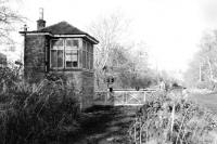 The signal box at Oakley Level Crossing on the NCB line to Comrie Colliery. Photographed on 24 November 1985 shortly after the track had been lifted. [See image 38835]<br><br>[Bill Roberton 24/11/1985]