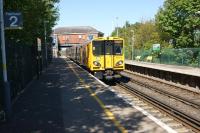 A Merseyrail Class 508 EMU calls at Hillside on 19 May 2013. Hillside is advertised as the station for the Royal Birkdale golf course and was opened by the LMS in 1926.<br><br>[John McIntyre 19/05/2013]
