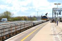 66068 at the head of a Network Rail PW train full of concrete sleepers passing through Didcot station on 26 March 2013.<br><br>[Peter Todd 26/03/2013]