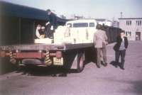 <I>Aye, it can be a smelly old business...</I> Fish boxes bound for London being loaded into vans at Fraserburgh 10 years to the day after Beeching - 27th March 1973. The stance of the gentleman on the right says it all. [See image 32177]<br><br>[David Spaven 27/03/1973]