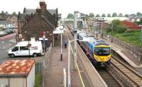 The 14.30 TransPennine service to Edinburgh (12.00 ex-Manchester Airport) about to leave Lockerbie on 11 June 2013.<br><br>[John Furnevel 11/06/2013]