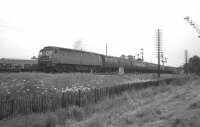 An old box camera photograph taken at Banbury in July 1965 showing a Brush Type 4 locomotive with the northbound <I>Pines Express</I> on its journey from Bournemouth to Manchester.<br><br>[Colin Miller /07/1965]
