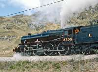 Black 5 No. 5305 runs parallel to the A830 about three-quarters of a mile east of Lochailort station while heading for Mallaig on 21 May 1987 with <I>The West Highlander</I>.<br><br>[Bill Jamieson 21/05/1987]