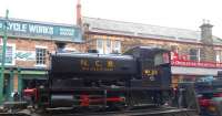 Ex-N.C.B. locomotive no 22 (AB 2274/1949) being transported along Beamish High Street on a low-loader on 10 April 2013.<br><br>[Brian Smith 10/04/2013]