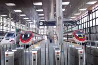 Departure from Cadiz is imminent for the emu standing at platform 5 and forming the 11.10 to Jerez de la Frontera on 3 May. On platform 3 is the empty stock of the twice daily AVE service to Madrid. The new terminus is immaculate, if a little under utilised at present.<br><br>[Andrew Wilson 03/05/2013]