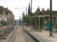 View east along Princes Street past The Mound tram stop on 18 June 2013.<br><br>[Bill Roberton 18/06/2013]