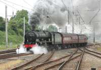 <I>Back on Parade</I>. Fresh from recent overhaul 46115 <I>Scots Guardsman</I> takes its first revenue earning train of the 2013 season out of Carnforth Down Loops and on to the main line heading for Carlisle on 20 June. After a trip over Shap and the S&C the Scot would hand this <I>Cumbrian Mountain Express</I> back to AL6 86259 at Farington Junction.<br><br>[Mark Bartlett 20/06/2013]