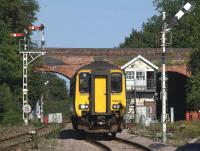 A train for Norwich arriving at Reedham station in July 2011.<br><br>[Ian Dinmore 02/07/2011]