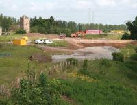 Scene on the south side of the Edinburgh City Bypass on 19 June 2013, with preparatory work in progress to take the Borders Railway north under the road to reach the new Shawfair station. Sheriffhall roundabout is just off picture to the left.<br><br>[John Furnevel 19/06/2013]