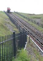 <I>Closed due to technical difficulties</I>. Not what you want to hear when you arrive at the foot of Saltburn cliffs. The water powered <I>Cliff Lift</I> had been operating earlier in the day but now the car seen here was stuck at the top and its counterpart in the promenade station.<br><br>[Mark Bartlett 06/06/2013]