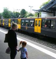 Refurbished and re-liveried T&W Metro set 4075 calls at North Shields on 12 June.<br><br>[Veronica Clibbery 12/06/2013]