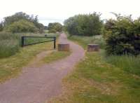 Looking north on the Brampton Valley Way at Brixworth, about a mile north of the heritage Northampton and Lamport Railway. In its declining years, this line between Northampton ad Market Harborough (closed in 1981) was only staffed overnight, for the passage of newspaper trains.<br><br>[Ken Strachan 12/06/2013]