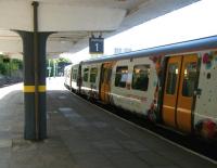 A train about to leave Platform 1 of Merseyrail's New Brighton station on 19 June 2013.<br><br>[Veronica Clibbery 19/06/2013]
