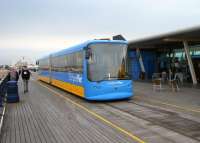 The twin-section articulated, battery powered tram car that provides a half-hourly service in both directions along the Southport Pier Tramway. The 3'6' gauge tramway runs the 3,600 feet length of Southport Pier, providing a public passenger service to the pier head.<br><br>[Veronica Clibbery 18/06/2013]