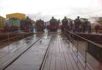 Far from ideal weather conditions for the Tyseley VT Open Day - but a glorious sight nonetheless. The locomotives are, from the left, Nunney Castle, Peckett no 1 of 1941, Rood Ashton Hall, Kinlet Hall and 2885. The observant will note that the latter is not in steam - having recently been rescued from 'informal storage' at Moor Street station. [See image 41818]<br><br>[Ken Strachan 23/06/2013]